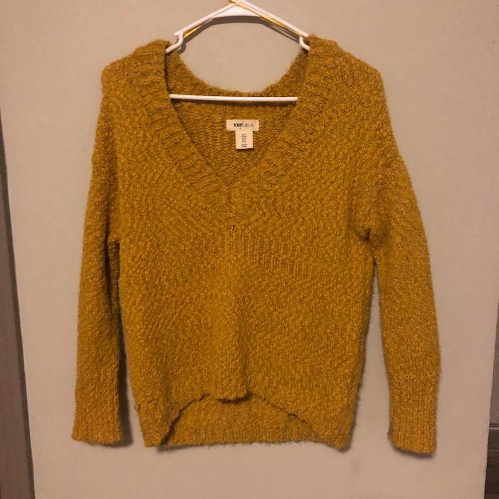 Yellow sweater slightly cropped